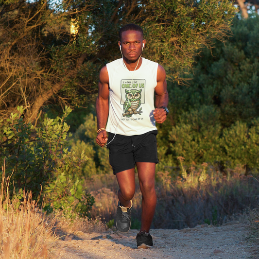 Man running on a trail with owl tank.